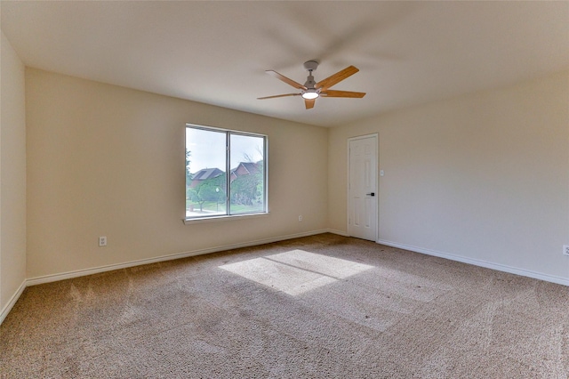7627 Sweetgum Dr, Irving, TX 75063 - carpeted empty room with a ceiling fan and baseboards