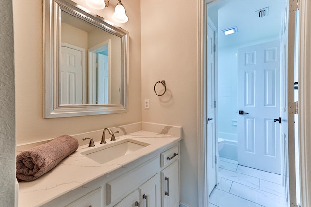 7627 Sweetgum Dr, Irving, TX 75063 - bathroom featuring vanity and toilet