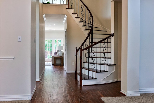 7627 Sweetgum Dr, Irving, TX 75063 - entryway featuring wood finished floors, baseboards, and stairs