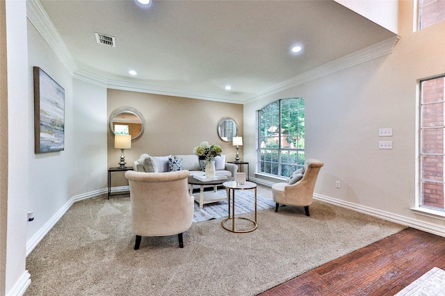 7627 Sweetgum Dr, Irving, TX 75063 - carpeted living room with baseboards, crown molding, recessed lighting, and wood finished floors