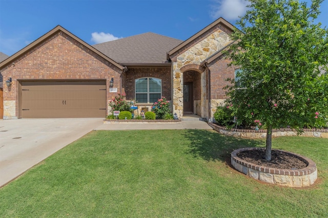 11312 Culberson Dr, Aubrey, TX 76227 - french country inspired facade featuring stone siding, an attached garage, a front lawn, brick siding, and concrete driveway