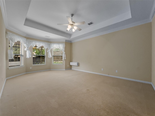 5143 Pond Bluff Way, Fairview, TX 75069 - empty room featuring a tray ceiling, ceiling fan, light colored carpet, and crown molding