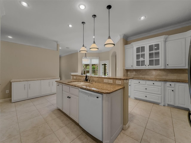 5143 Pond Bluff Way, Fairview, TX 75069 - kitchen with dishwasher, a sink, crown molding, backsplash, and a center island with sink