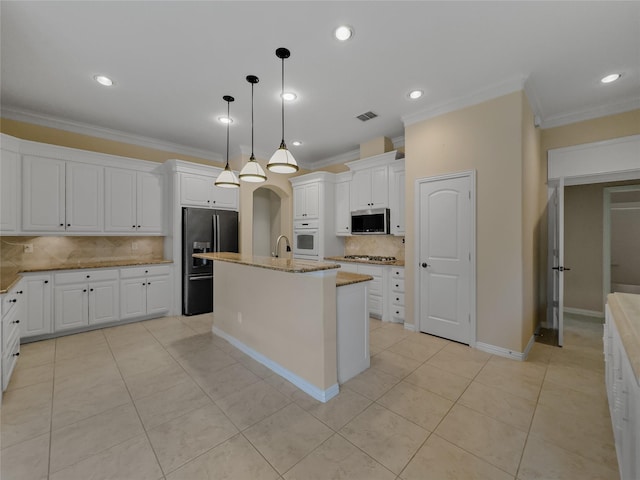 5143 Pond Bluff Way, Fairview, TX 75069 - kitchen with stainless steel appliances, ornamental molding, backsplash, light tile patterned flooring, and white cabinets