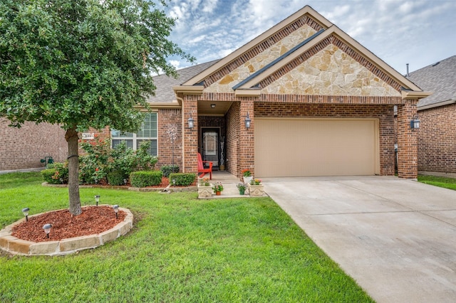 820 Lake Sierra Way, Little Elm, TX 75068 - view of front of home featuring a garage, concrete driveway, a front lawn, and brick siding