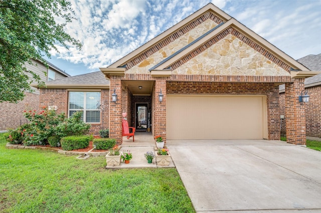 820 Lake Sierra Way, Little Elm, TX 75068 - view of front of home with an attached garage, brick siding, concrete driveway, a front lawn, and stone siding