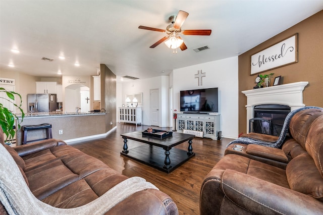 820 Lake Sierra Way, Little Elm, TX 75068 - living area with ceiling fan, a chandelier, dark wood-type flooring, and baseboards