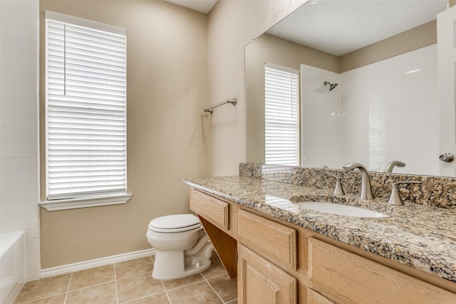 7816 Hardwick Ct, Plano, TX 75025 - full bathroom with vanity, toilet, tile patterned floors,  shower combination, and baseboards