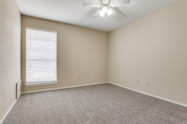 7816 Hardwick Ct, Plano, TX 75025 - carpeted empty room with a ceiling fan, plenty of natural light, a textured ceiling, and baseboards