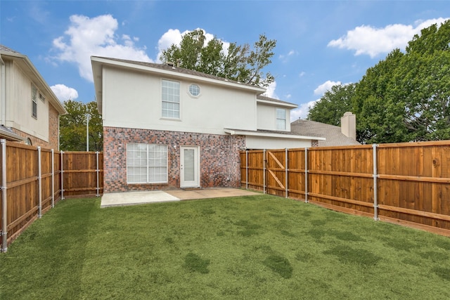7816 Hardwick Ct, Plano, TX 75025 - back of property featuring brick siding, a patio area, and stucco siding