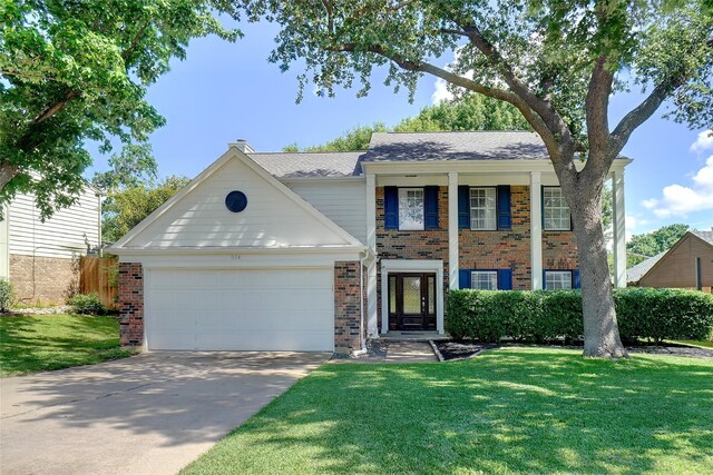 514 Chasewood Dr, Grapevine, TX 76051 - greek revival inspired property with brick siding, a garage, a front yard, and concrete driveway