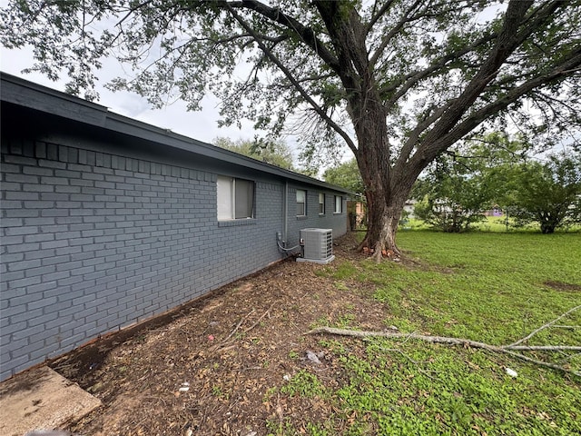 140 Shirley Dr, Lacy Lakeview, TX 76705 - view of grassy yard with central AC unit