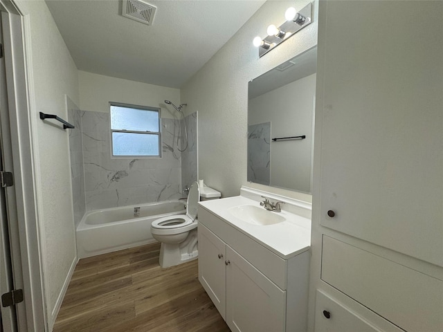 140 Shirley Dr, Lacy Lakeview, TX 76705 - bathroom featuring wood finished floors, toilet, bathtub / shower combination, and vanity