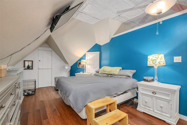 306 College St, Red Oak, TX 75154 - bedroom with wood finished floors and vaulted ceiling