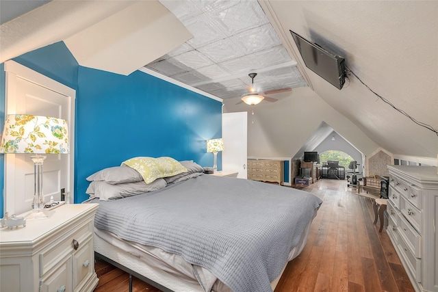 306 College St, Red Oak, TX 75154 - bedroom with hardwood / wood-style floors, lofted ceiling, and ceiling fan