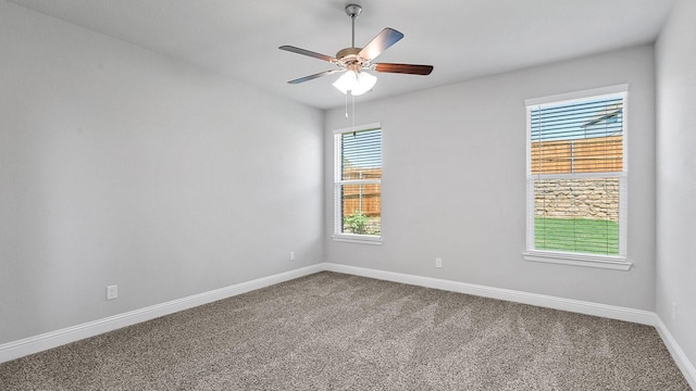 8721 Leafy Ln, Justin, TX 76247 - carpeted empty room featuring baseboards and a ceiling fan