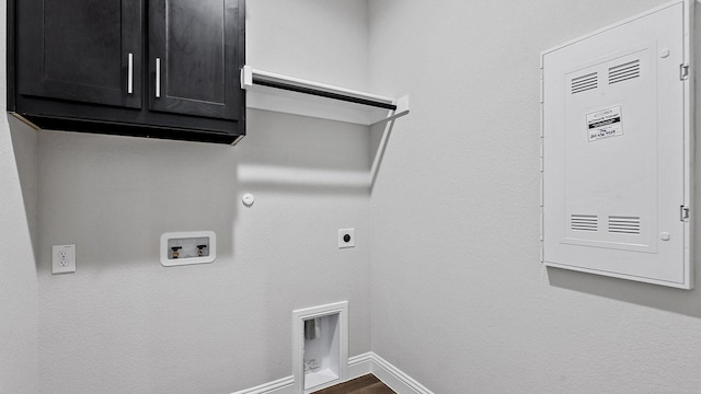 8721 Leafy Ln, Justin, TX 76247 - clothes washing area with washer hookup, hookup for an electric dryer, baseboards, gas dryer hookup, and cabinet space