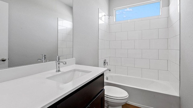 8721 Leafy Ln, Justin, TX 76247 - bathroom featuring toilet,  shower combination, and vanity