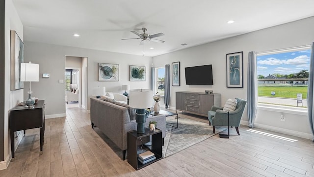 1303 Finley Dr, Mansfield, TX 76063 - living area with light wood-style floors, baseboards, a ceiling fan, and recessed lighting