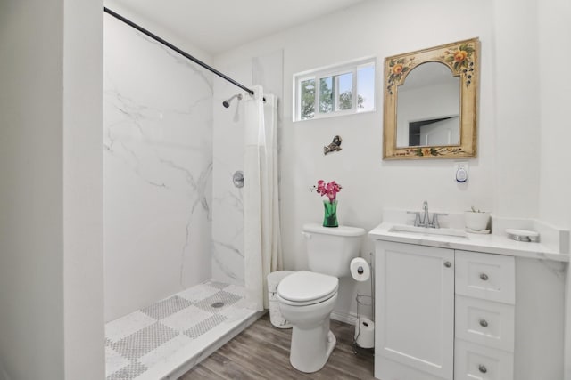 4711 W Wedgefield Rd, Granbury, TX 76049 - full bath featuring toilet, a marble finish shower, vanity, and wood finished floors