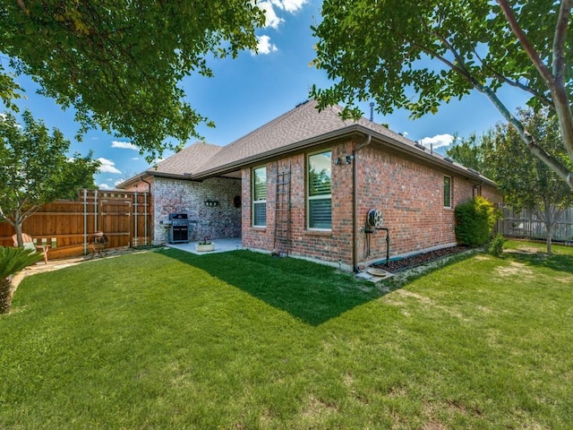 13026 Brook Ridge Dr, Frisco, TX 75035 - back of house with brick siding and a patio