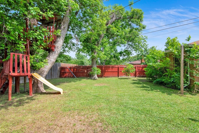 view of yard featuring a playground