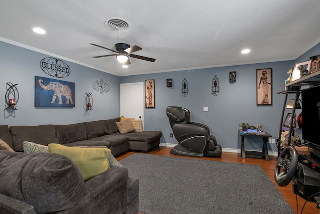 living area featuring wood finished floors, ceiling fan, ornamental molding, recessed lighting, and baseboards