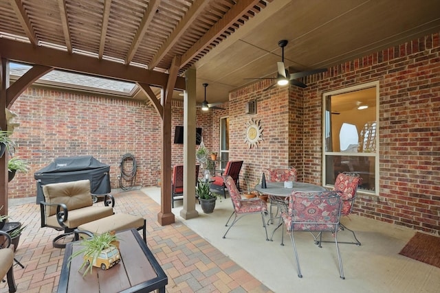 2801 Spring Oaks Dr, Highland Village, TX 75077 - view of patio featuring ceiling fan, area for grilling, and outdoor dining area