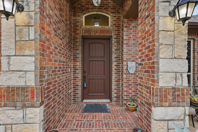 2801 Spring Oaks Dr, Highland Village, TX 75077 - entrance to property featuring brick siding and stone siding