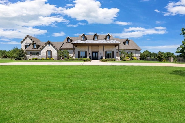 view of front facade featuring stone siding and french doors