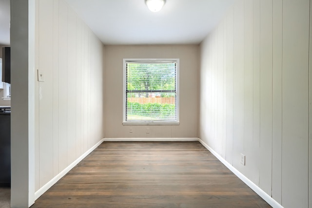 2133 Gus Thomasson Rd, Dallas, TX 75228 - spare room with dark wood-style floors and baseboards