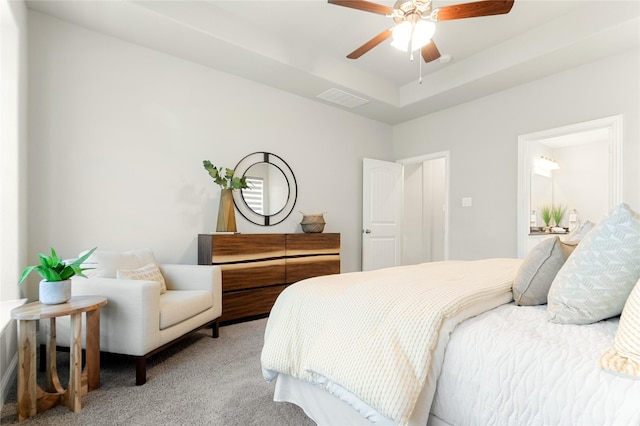 13326 Decidedly Dr, Frisco, TX 75035 - bedroom featuring carpet floors, a tray ceiling, and ceiling fan