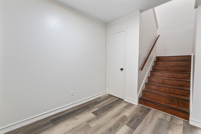 1811 E Grauwyler Rd Unit 138, Irving, TX 75061 - stairway with wood finished floors and baseboards