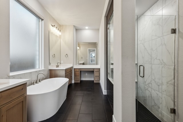 2921 Citation Rd, Celina, TX 75009 - bathroom with a stall shower, tile patterned flooring, a freestanding bath, and two vanities