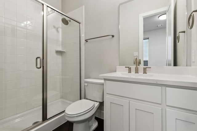 2921 Citation Rd, Celina, TX 75009 - full bathroom featuring a stall shower, toilet, and vanity