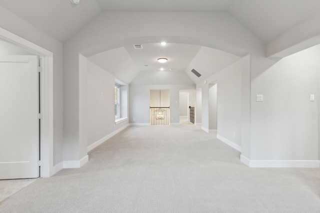 2921 Citation Rd, Celina, TX 75009 - bonus room featuring vaulted ceiling, arched walkways, light carpet, and baseboards