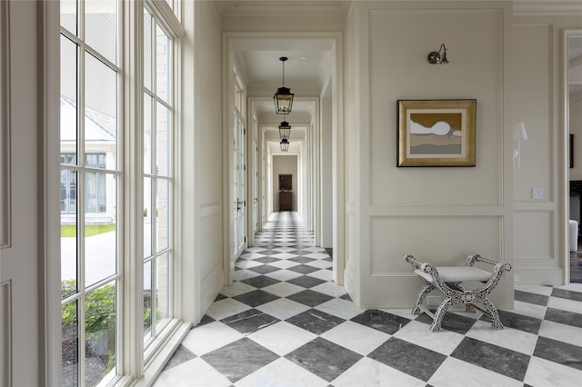 5610 Lobello, Dallas, TX 75229 - hallway featuring a decorative wall, ornamental molding, and light tile patterned floors
