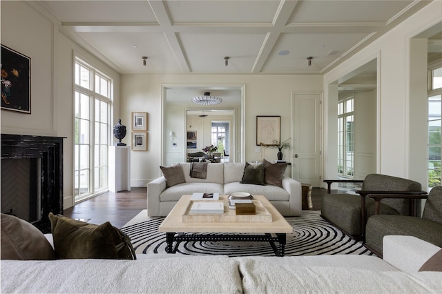 5610 Lobello, Dallas, TX 75229 - living area with coffered ceiling, wood finished floors, a fireplace, and beam ceiling