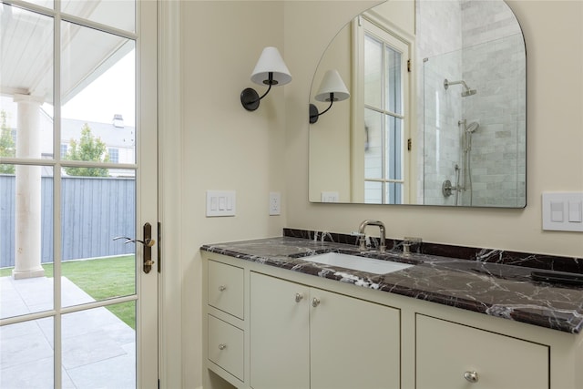 5610 Lobello, Dallas, TX 75229 - bathroom featuring vanity and tiled shower