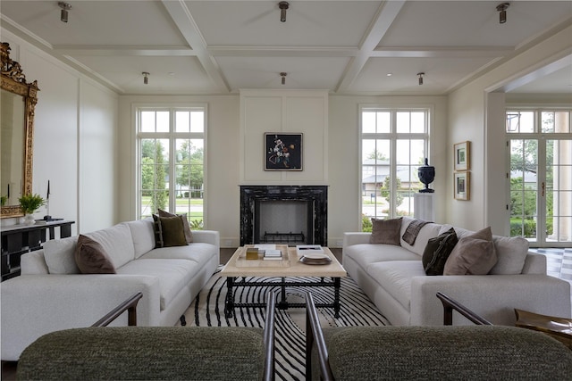 5610 Lobello, Dallas, TX 75229 - living room featuring coffered ceiling, a premium fireplace, plenty of natural light, and beam ceiling
