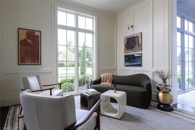 5610 Lobello, Dallas, TX 75229 - sitting room with a decorative wall, plenty of natural light, and crown molding