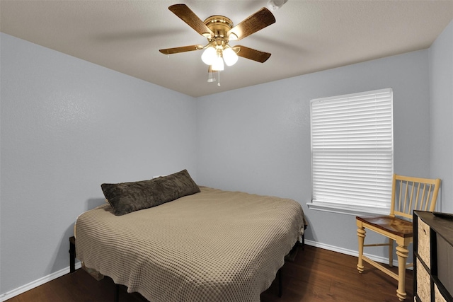 5061 Britton Ridge Ln, Fort Worth, TX 76179 - bedroom with baseboards, wood finished floors, and a ceiling fan