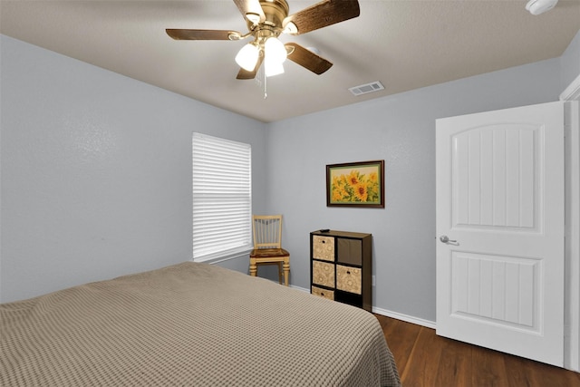 5061 Britton Ridge Ln, Fort Worth, TX 76179 - bedroom with dark wood-style flooring, ceiling fan, and baseboards