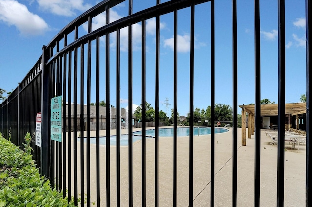 5061 Britton Ridge Ln, Fort Worth, TX 76179 - gate featuring fence and a community pool