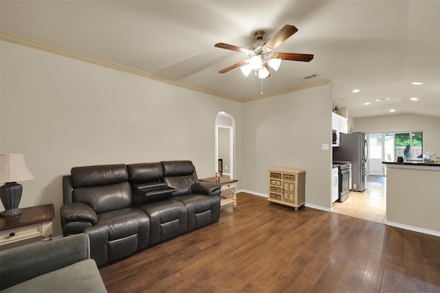 5061 Britton Ridge Ln, Fort Worth, TX 76179 - living room with arched walkways, recessed lighting, ceiling fan, light wood-type flooring, and baseboards