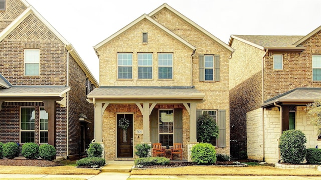 7436 Palisades Dr, Rowlett, TX 75088 - view of front of home with covered porch and brick siding