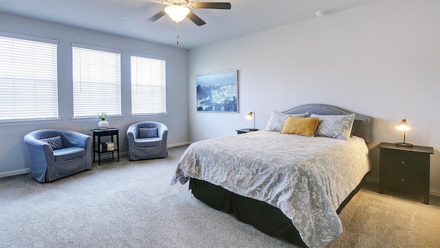 7436 Palisades Dr, Rowlett, TX 75088 - bedroom with light colored carpet, baseboards, and ceiling fan