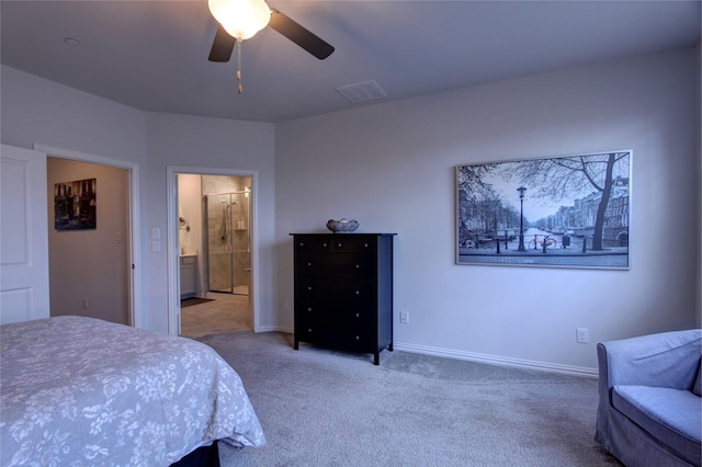 7436 Palisades Dr, Rowlett, TX 75088 - carpeted bedroom with baseboards, ensuite bath, and a ceiling fan