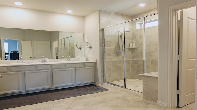 7436 Palisades Dr, Rowlett, TX 75088 - bathroom with a shower stall, double vanity, and recessed lighting