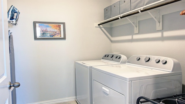 7436 Palisades Dr, Rowlett, TX 75088 - clothes washing area featuring washing machine and clothes dryer